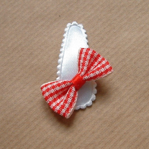 Barrette Bebe A Noeud Papillon Rouge Sur Satin Plein De Bisous